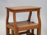 an image of a wooden step stool on a white background
