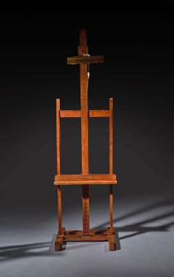 an image of a wooden easer with a cross on top of it