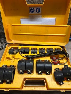 a yellow case that has a bunch of electrical equipment in it