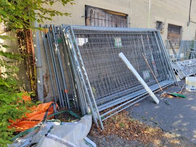 many metal barricades on the side of the street