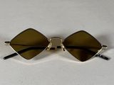 sunglasses on a white table with a white table cloth