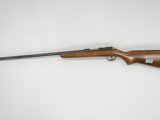 a rifle on a white background