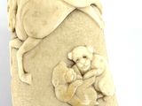 a vase that has a picture of a woman and a dog on it