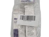a bag of toothpaste and toothpaste on a white background