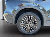 a close up of a car ' s tire on the ground