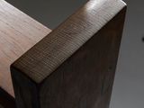 a close up view of a wooden bench with a white background