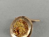a close up of a gold plated ring with a yellow druzy stone