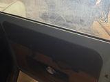 the door of a car is open and the door is closed