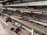 a large amount of steel beams in a warehouse