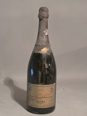 a bottle of wine that is sitting on a table
