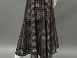 a black and white skirt and blouse on a mannequin mannequin mannequin mannequin mannequin mannequin mannequin manne