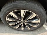 the tire of a car is shown on the side of the road
