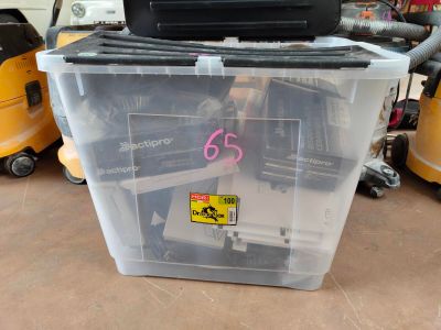 a plastic container that has a tv on top of it