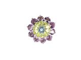 an image of a close up of a ring with purple and green stones
