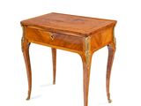 a small wooden table with a drawer on top of it