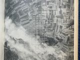 an open book with a picture of a city in the middle of it