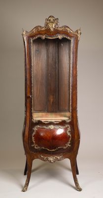 an old wooden chair with a wooden seat on it