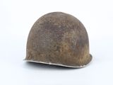 a helmet on a white surface with a white background
