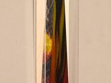 a picture of a tie hanging on a wall