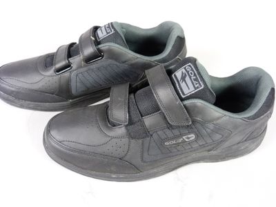 pair of children ' s shoes with velcro straps on a white background
