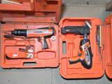 an orange tool case with tools in it sitting on the floor