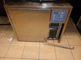 an image of a kitchen with a toaster and a toaster oven