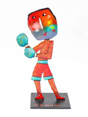 a colorful figurine of a man with boxing gloves