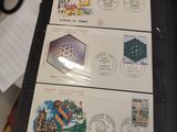 a picture of a folder with stamps on it sitting on a table