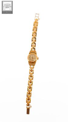 an image of a wrist watch with a chain around it