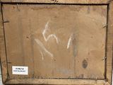 a picture of a wooden box with a tag on it