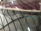 a picture of a building that has a glass roof on it