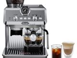 an image of a coffee machine with a cup of coffee next to it
