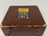 a brown suitcase with a sticker on it that says home lines