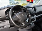 a steering wheel and dashboard of a small car