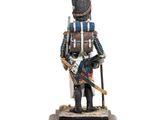 statue of a soldier with a sword and a hat on a wooden base