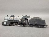 a toy train that is sitting on the tracks