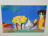 cartoon picture of a couple of people sitting at a table with food