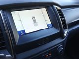 a picture of a car dashboard with a cell phone in it