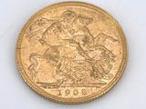 an image of a gold coin with a picture of a man on a horse