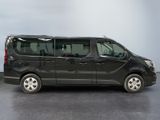 a picture of a black van parked in a garage