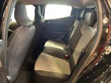 a car that has two seats in the back of it