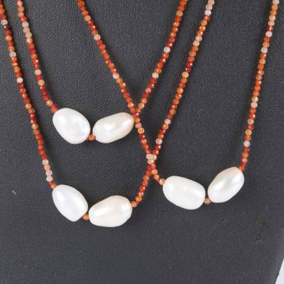 a close up of a necklace on a mannequin mannequin