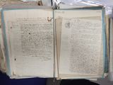 a large open book that is sitting on top of a table