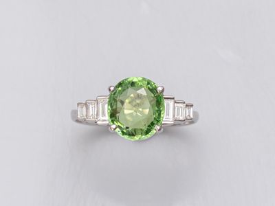 a green tourmaline and diamond ring
