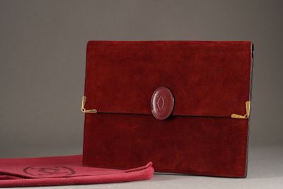 leather case with a red cloth on the side and a red cloth on the other side