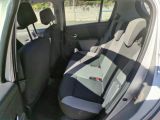a car that has a seat in the back of it