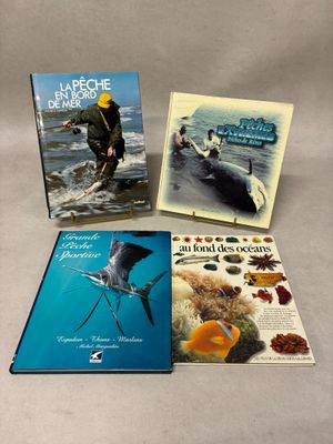 three books on a table with a man in a yellow hat and a man in a yellow hat