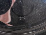 a close up of a pan with a lid on a stove