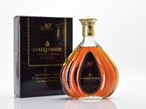 an image of a bottle of courvoisier with a box in the background