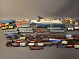 a lot of toy trains that are on the table